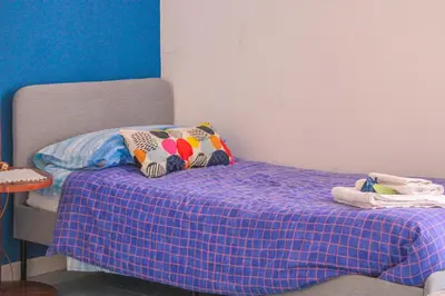 Letto o letti in una camera di Casa Lego Napoli
