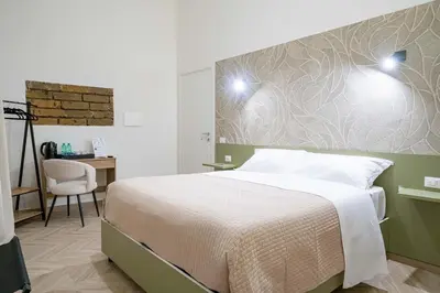 Letto o letti in una camera di Relais Borbonico Museo