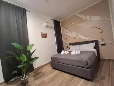 Letto o letti in una camera di Palace Ecce Hom0
