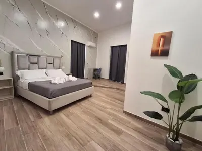 Letto o letti in una camera di Palace Ecce Hom0