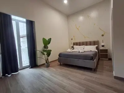 Letto o letti in una camera di Palace Ecce Hom0