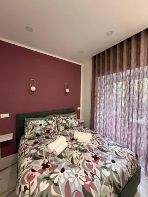 Letto o letti in una camera di DEA Suite & Garden