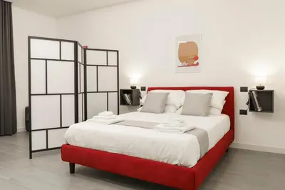 Letto o letti in una camera di Eleven Studios