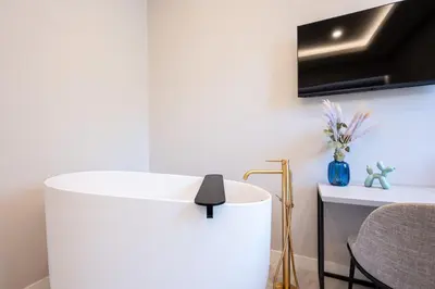 TV o dispositivi per l'intrattenimento presso Plebiscito Luxury Guest House