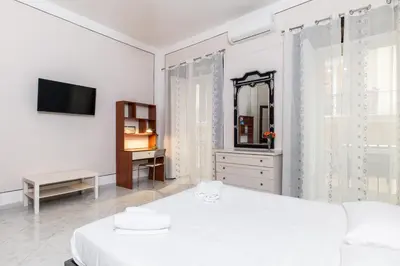 Letto o letti in una camera di Just a Perfect Stay By Dimorra