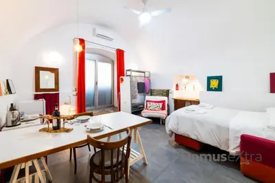 Letto o letti in una camera di Gatto Giallo a Chiaia By DomusExtra