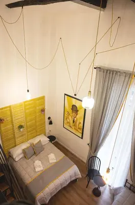 Letto o letti in una camera di B&B Vico Giganti
