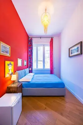 Letto o letti in una camera di Joy Stay Old Town by NapoliApartments