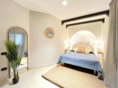 Letto o letti in una camera di Aura Suites Napoli