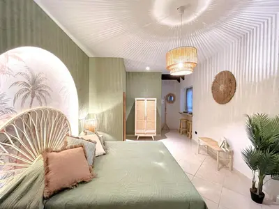Letto o letti in una camera di Aura Suites Napoli