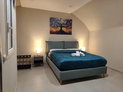 Letto o letti in una camera di Casa Emi- Palazzo Imperiale D'Afflitto