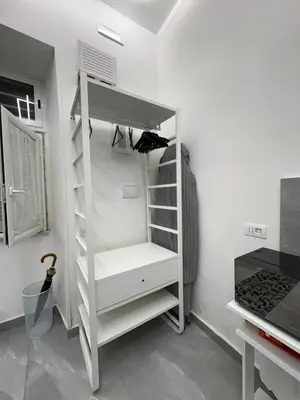 Letto o letti in una camera di Casa robe`