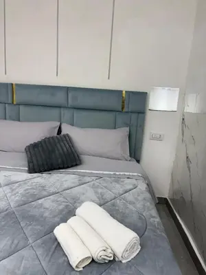 Letto o letti in una camera di Casa robe`