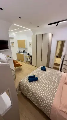 Letto o letti in una camera di Vicolo Vivo Home