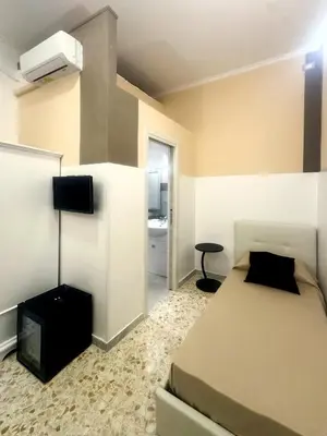Letto o letti in una camera di Lenny House