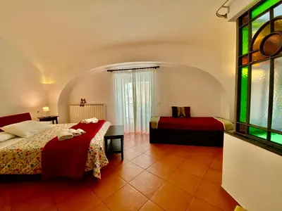 Letto o letti in una camera di Borgo Belvedere
