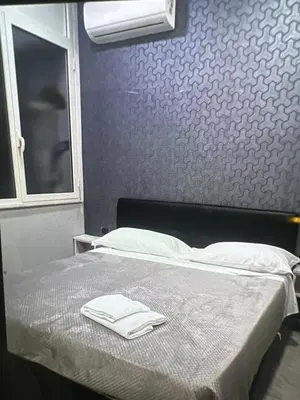 Letto o letti in una camera di Hotels Int&rnational Napoli