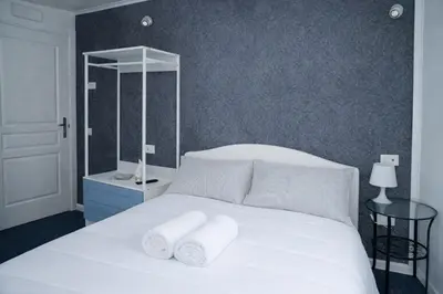 Letto o letti in una camera di Napul'è Riviera