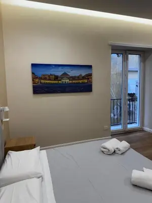 Letto o letti in una camera di Maison Napoli Centrale