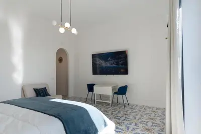 Letto o letti in una camera di Chiaia 150