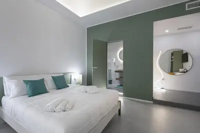 Letto o letti in una camera di Mo' Vediamo rooms