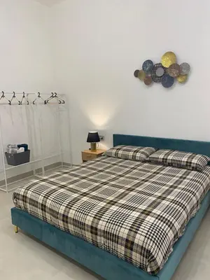 Letto o letti in una camera di Basile House