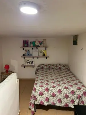 Letto o letti in una camera di Ai Baretti B&B