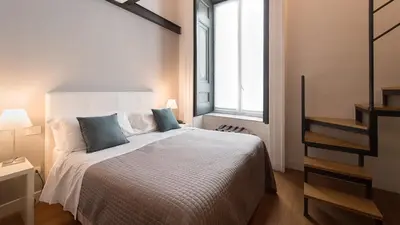 Letto o letti in una camera di Santa Chiara Boutique Hotel