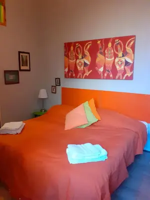 Letto o letti in una camera di San Gregorio Studio