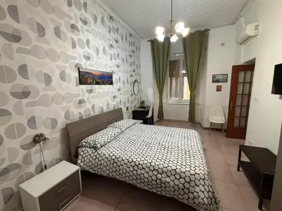 Letto o letti in una camera di Trimarchi House
