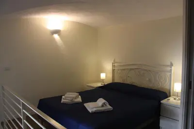 Letto o letti in una camera di B&B Il Conservatorio