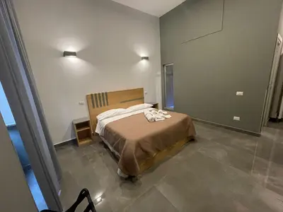 Letto o letti in una camera di Be Italian Flat Bovio