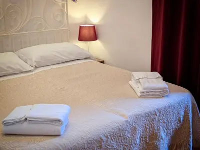 Letto o letti in una camera di Locanda Dell'Arte