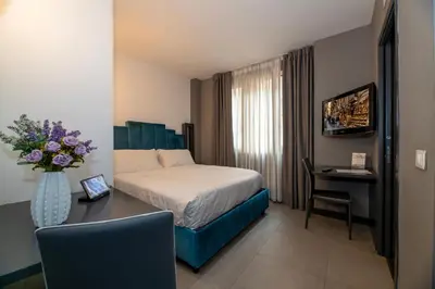 Letto o letti in una camera di Golden Hotel
