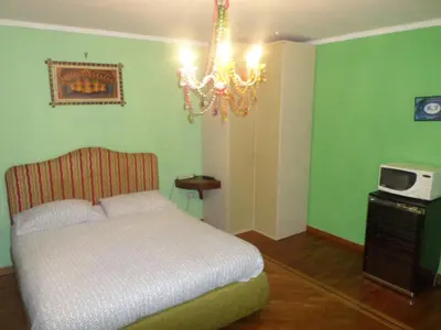 Letto o letti in una camera di b&b Zia Sua
