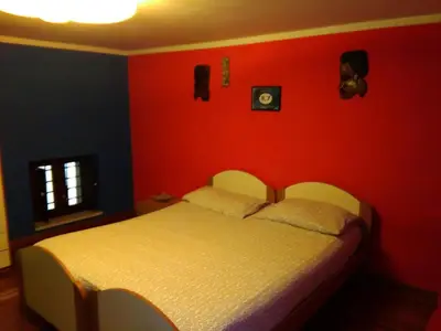 Letto o letti in una camera di b&b Zia Sua