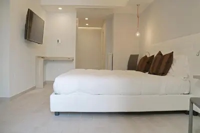 Letto o letti in una camera di Riviera Luxury Suites
