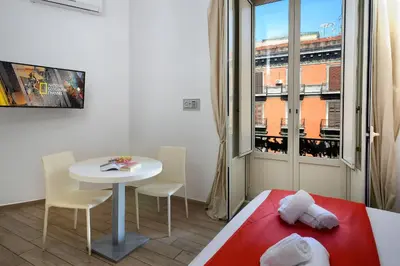 Letto o letti in una camera di B&B Funikuli Funikula