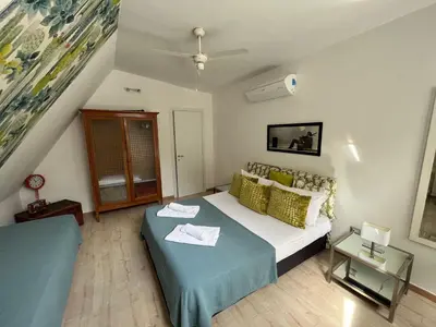 Letto o letti in una camera di Historic Naples Relais Le Terrazze