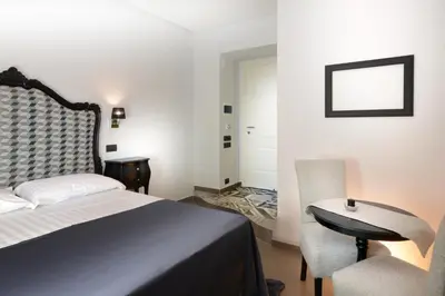 Letto o letti in una camera di Barbarella Suite