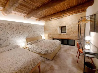 Letto o letti in una camera di Talismano Luxury Suite & Loft & Alcova & Maison
