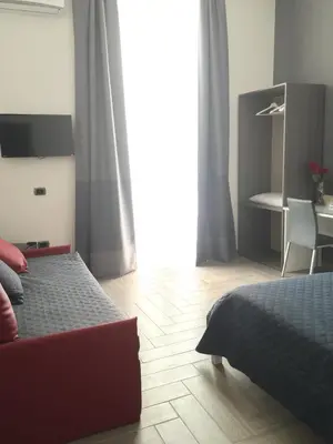 Letto o letti in una camera di La Dimora di Garibaldi