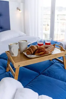 Letto o letti in una camera di Nel Cuore di Parthenope