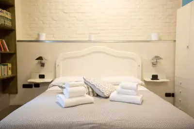 Letto o letti in una camera di Two Sisters Suites
