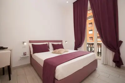 Letto o letti in una camera di Suite dei Catalani