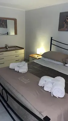 Letto o letti in una camera di Welcome House