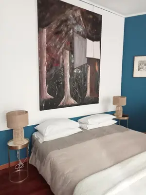 Letto o letti in una camera di Altera Domus