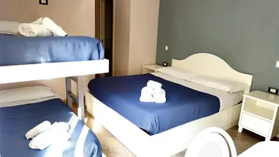 Letto o letti in una camera di B&B Federico II
