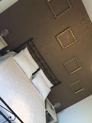 Letto o letti in una camera di Casa Castel Capuano