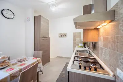 Cucina o angolo cottura di GARDEN HOUSE Apartments in Naples